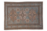 Distressed vintage Persian Hamadan rug with a triple diamond medallion in soft sky blue and beige.