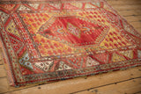 Hand-knotted Anatolian rug, cherry red abrashed field, diamond medallion, saffron palmette design.