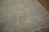 Softly worn pile of a vintage Afshar rug featuring powder blue and pale terra cotta botehs.