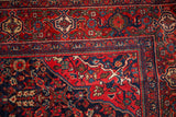 Intricate Turtle Samovar main border with meandering vines in navy blue, red, and dusty teal.
