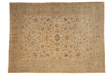 Vintage distressed Kashan carpet with a starburst medallion and floral field in soft beige, ivory, and dusty blue.