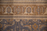 Distressed vintage Sivas rug showcasing coffee brown Turtle Samovar main border and blue Herati field.