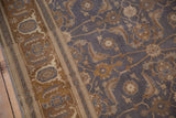 Distressed dusty blue Herati field meets coffee brown Turtle Samovar border, vintage Sivas rug.