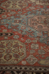 Close perspective of a Caucasian Soumac's flatweave texture and intricate geometric guls.