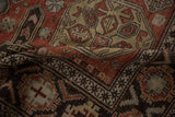 Close-up on the supple flatweave and reciprocating wave border of an antique Caucasian Soumac.