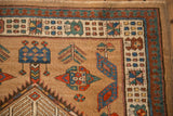 Geometric pawn motif border and germinating plant designs on a vintage hand-knotted Serab runner.