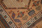A vintage Serab rug's corner showing geometric guls and a reciprocating pawn design border.