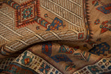 Folded view of the Serab runner's camel ground, showing the textured pile and geometric pawn motifs.