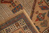 A vintage Serab's intact side cord selvage and the border's reciprocating pawn design motif.