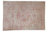 Distressed vintage Kaisary rug, arabesque medallion, faded pink, terra cotta floral, 7x10.