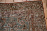 Distressed vintage Hamadan rug runner, dusty blue and rust Herati pattern with foundation showing.