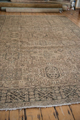 Vintage Distressed Karaja rug with geometric border pattern, worn texture, and end fringe.