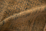 Vintage distressed Bijar rug pile texture in tea washed brown and dusty teal.