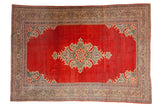 Vintage Mahal carpet with a central medallion and jade green accents on an abrashed cherry red field.