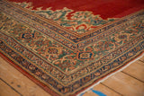 Corner of a vintage Mahal carpet with its distinctive jade green Herati and turtle border.