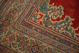 Turtle samovar and vine boteh borders in jade green and sapphire blue on a vintage Mahal carpet.