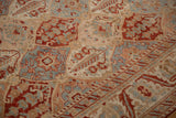 Detail of a distressed Bakhtiari's low pile with floral motifs in dusty blue, rose, and red.