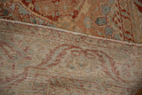 Hand-knotted construction seen from the back of the vintage distressed Bakhtiari rug.
