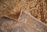 Hand-knotted foundation and restored side cord selvage on a vintage distressed Malayer rug corner.