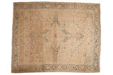 Distressed Vintage Persian Heriz carpet, cream field, geometric medallion, dusty blue Herati border.
