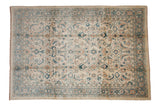 Mahal carpet with an allover Herati design in dusty teal and terracotta on an ivory field.