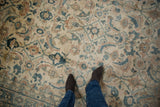 Close-up of the Mahal carpet's even pile and Herati design in dusty teal and terracotta.