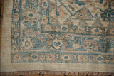 Mahal carpet corner with intact ivory selvage, fringe, and dusty teal Herati design border.