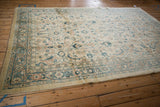 Angled view displaying the full length of the traditional Persian Mahal carpet.
