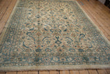 Angled view of a Persian Mahal carpet highlighting its textural pile and allover Herati design.