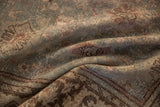 Close-up on the distressed, hand-knotted texture and even wear of the vintage Mahal carpet pile.