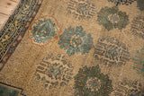 Antique Malayer rug with teal and brown trident guls on subtle ivory lattice, foundation visible.