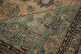 Antique Malayer rug's stepped contour, showing teal guls, tan Herati motifs, and chestnut vine border.