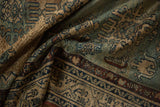Patinated navy, beige, chestnut meandering vine and boteh border on antique Malayer.