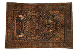 Antique Farahan Sarouk rug with a pictorial hunting scene and tree of life motif in navy blue, brown, and ivory.