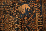 A hand-knotted lion from the pictorial hunting scene of an antique Farahan Sarouk rug.