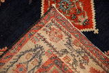 Hand-knotted foundation of a vintage Persian Malayer showing the detailed weave and knot heads.