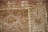 Heavily abrashed texture and short pile of a distressed vintage Kars carpet.