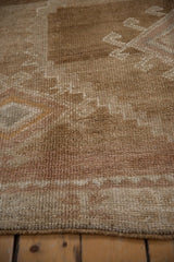 Close texture of the short, even pile on a vintage distressed Kars carpet.