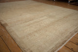 Vintage distressed Kars carpet, displaying faded trellis pattern and textured sand and cream pile.