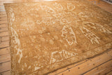 Angled view of the vintage Kars carpet, showing its low-pile texture and warm sand and ivory tones.