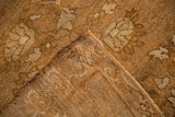 A folded corner reveals the durable hand-knotted weave of a vintage Turkish Kars rug.