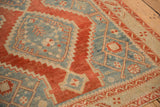 Even wear across knot heads and low pile on a distressed Karabagh vintage rug.