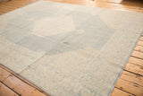 Vintage Distressed Tabriz carpet corner, faded blue Herati motif, ivory palmette border, side selvage.