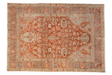 Vintage distressed Baktiari rug with a geometric Tree of Life design in cherry red, powder blue, and neutral tones.