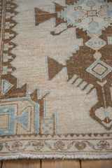 Close-up showing the even wear to the knot heads on this distressed vintage Hamadan rug.