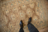 Vintage Afghan rug's hand-knotted texture showing mostly even wear to the knot heads.