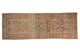 Distressed Persian Malayer runner with an allover Herati design in dusty blue, rust orange, and dark chocolate brown.