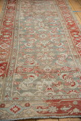 Mostly even wear to the knot heads and heavy color variation on a distressed Malayer rug.