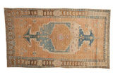 Vintage Distressed Northwest Persian rug with oversized medallion, abrashed field, sand and sky blue, 4'4