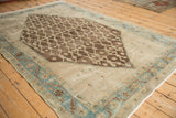 Distressed Hamadan rug with abrashed ivory ground and dusty powder blue border detail.